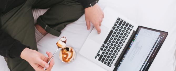 eating next to laptop